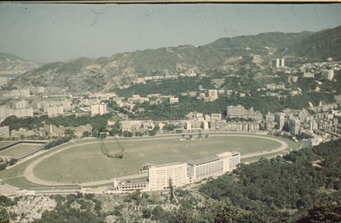A picture containing text, mountain, road, way
Description automatically generated